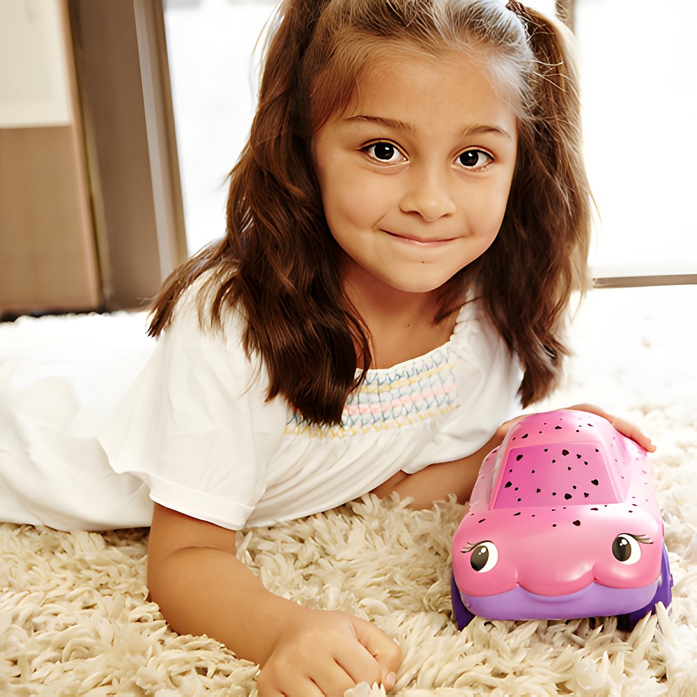 Cloud b Twilight Carz Pink Hearts, lifestyle photo with smiling girl and pink car night light