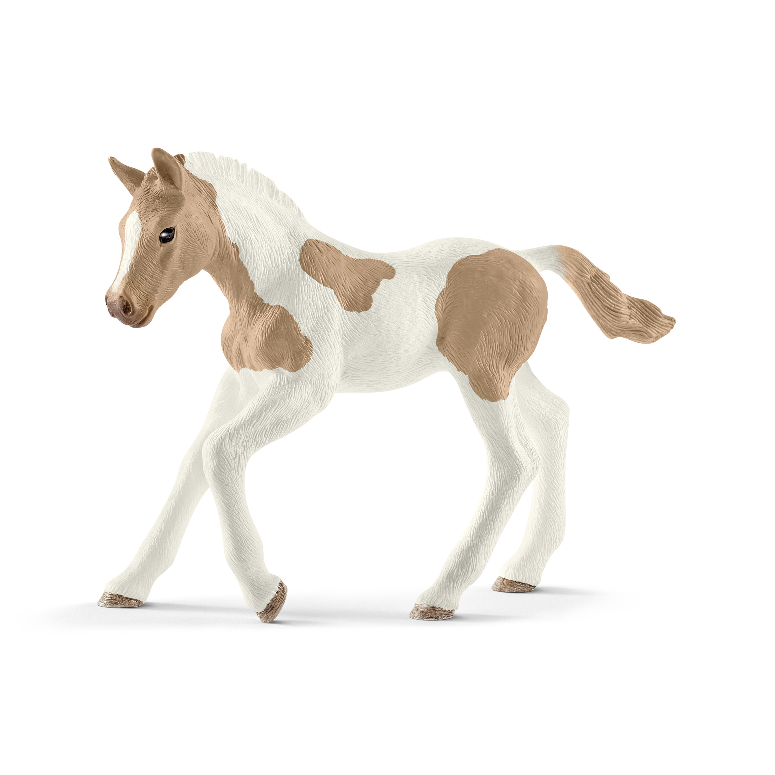 Schleich Horse Club Paint Horse foal, toy figure with brown and white piebald coat, walking