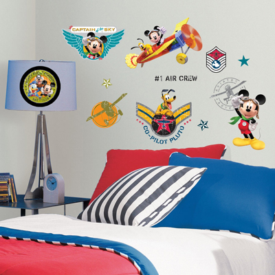 RoomMates wall decal Disney Mickey Mouse Clubhouse Pilot, Mickey and Pluto as a flying crew with aeroplane and badge motifs on a grey children's room wall