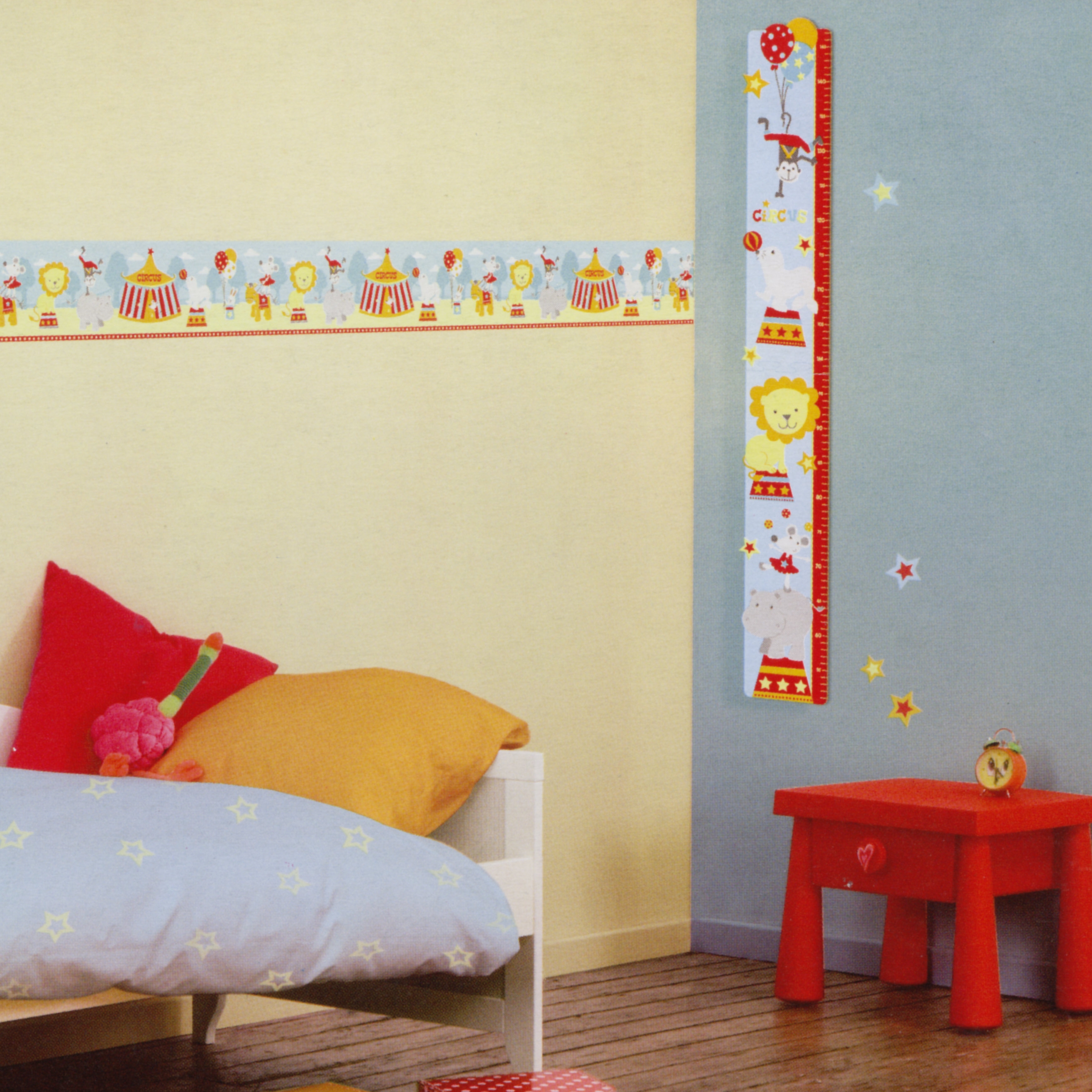 decofun growth chart Circus lifestyle photo, on a blue wall next to a bed with a matching circus border and red stool