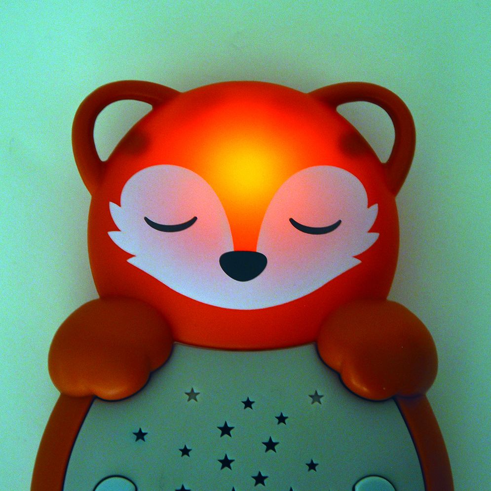 Cloud b sleep aid Sweet Dreamz on the Go fox, close-up glowing orange in the dark