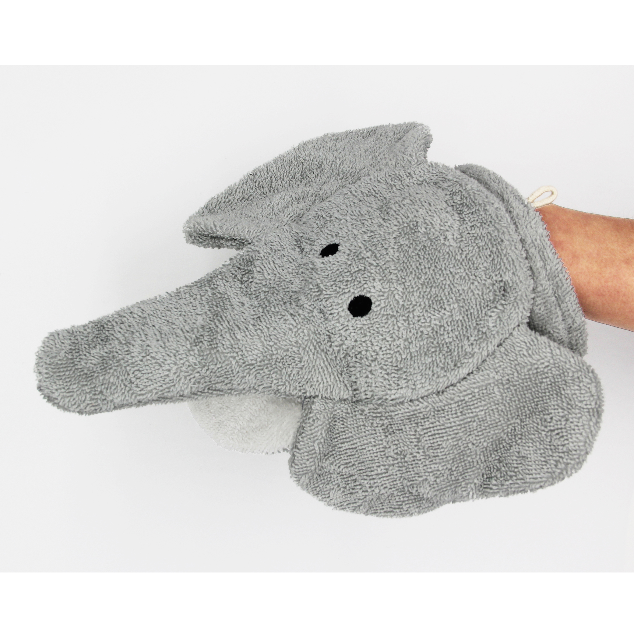 Fürnis organic washcloth elephant Ella worn as mitt on arm, trunk to the side, grey ears