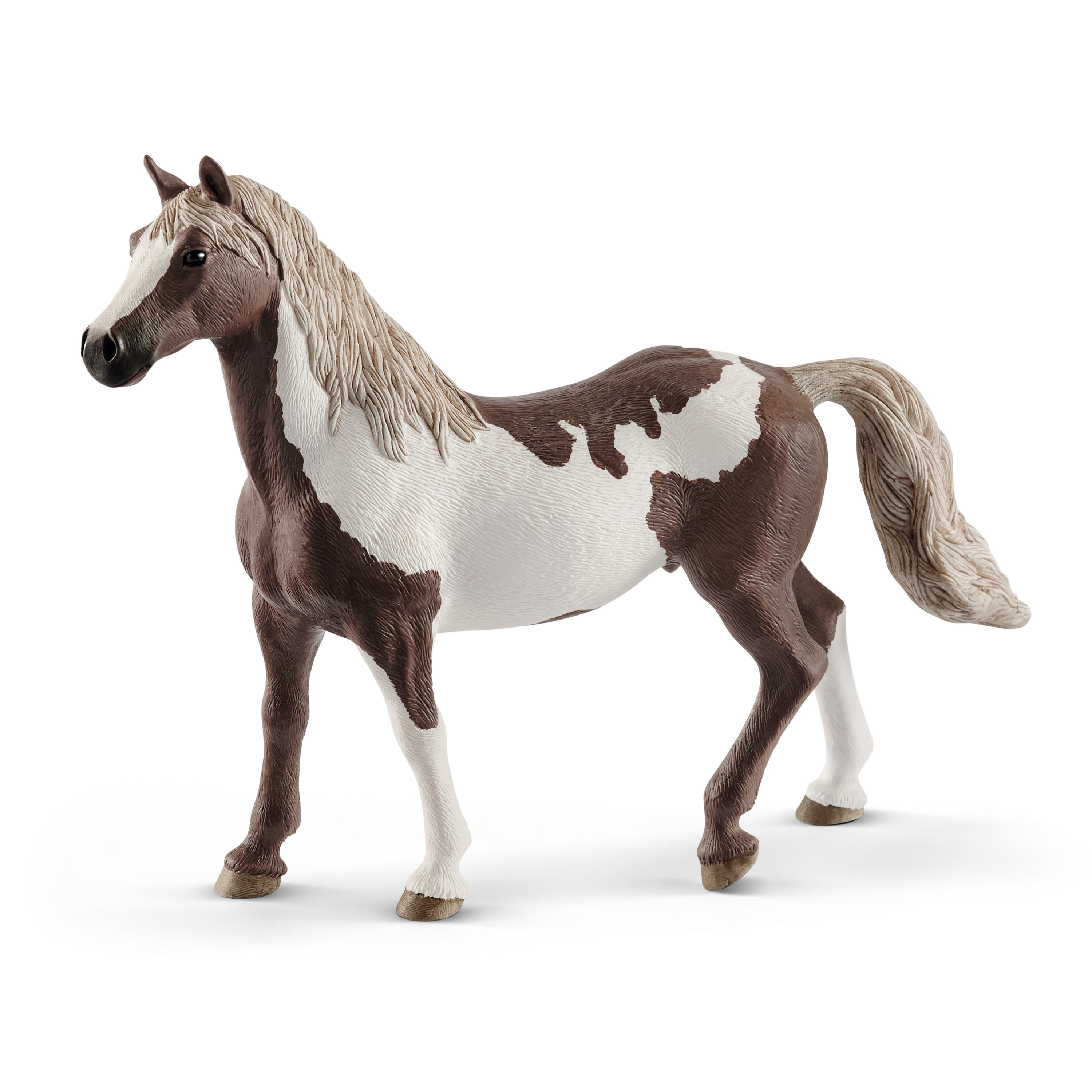 Schleich Horse Club Paint Horse gelding, toy figure with dark brown and white piebald coat, walking