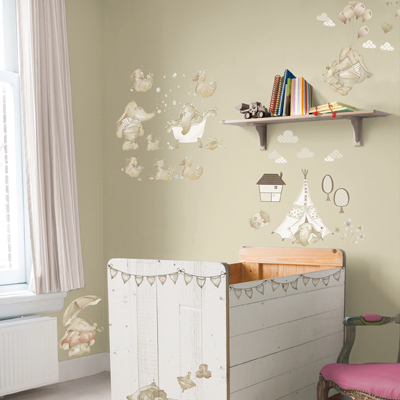 graham & brown 3D wall decoration Eleflump, decorated wall above a cot with elephants, clouds and a tent in soft beige tones