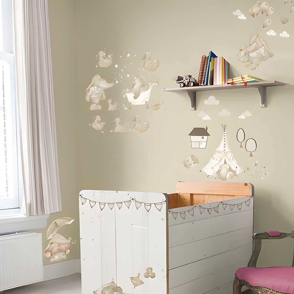 graham & brown 3D wall decoration Eleflump, decorated wall above a cot with elephants, clouds and a tent in soft beige tones